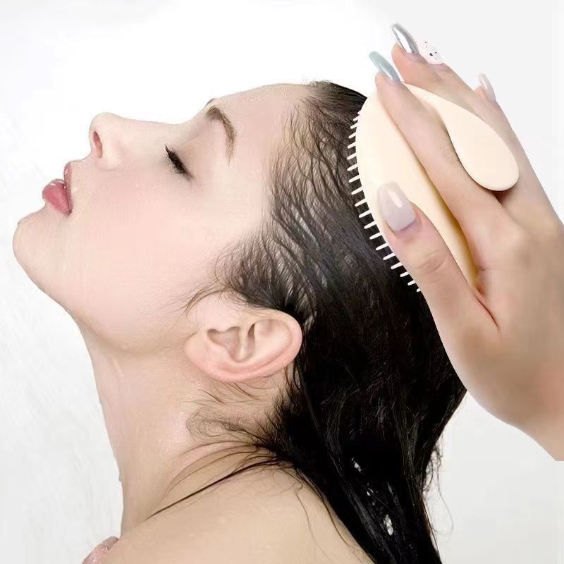 LEVIRO Scalp Ritual Brush — used on wet hair while cleansing